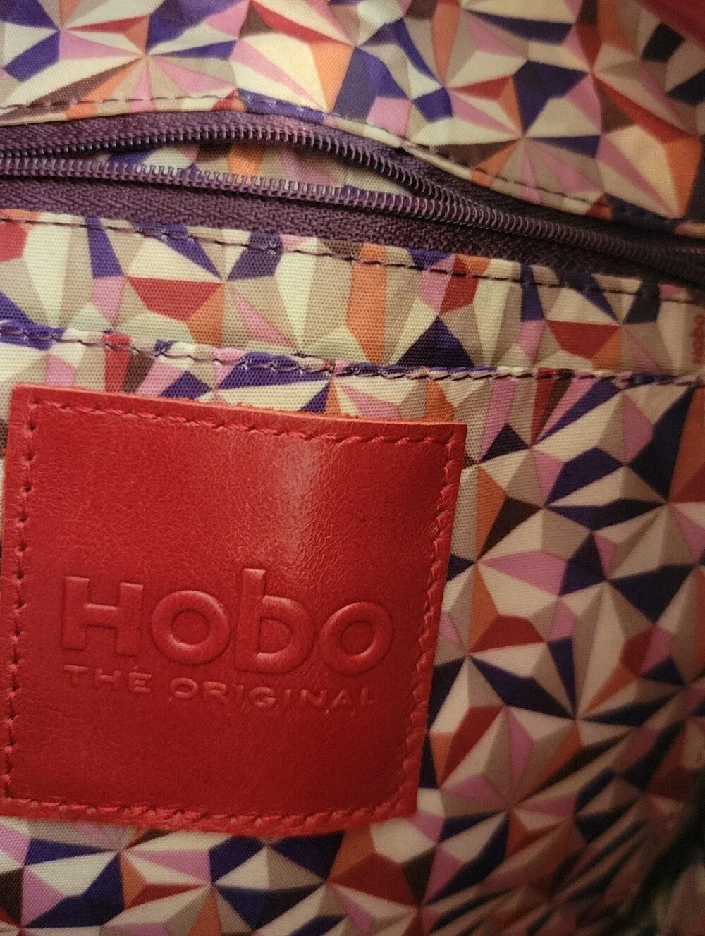 Hobo Women's Red Leather Shoulder Bag With 1 Strap, and Magnetic Close.
